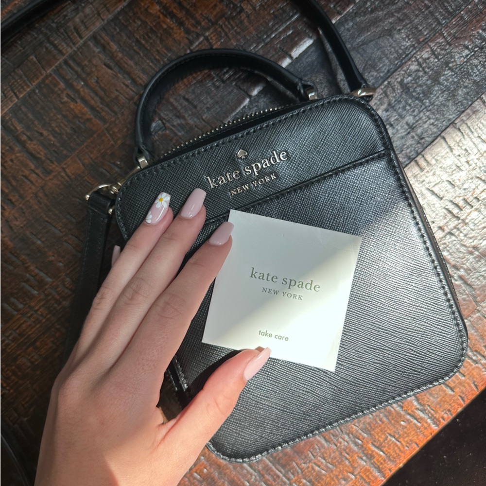 Black camera bag from Kate Spade with tags!